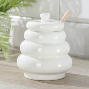 جرة عسل بيضاء مصنوعة من السيراميك