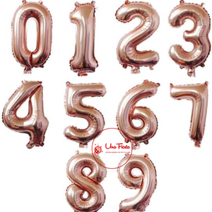 Rose-gold foil balloon numbers 