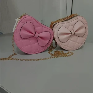 شنطة شكل قلب – أناقة ورُقي في تصميم فريد