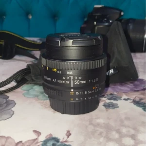 عدسه 50mm F1.8 d 