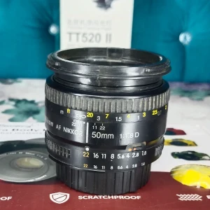 عدسه نيكون 50mm F 1.8 d كسر زيرو 