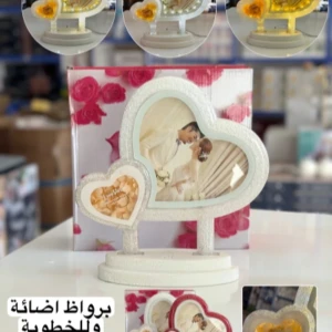 برواظ قلبين وLOVE مضيء